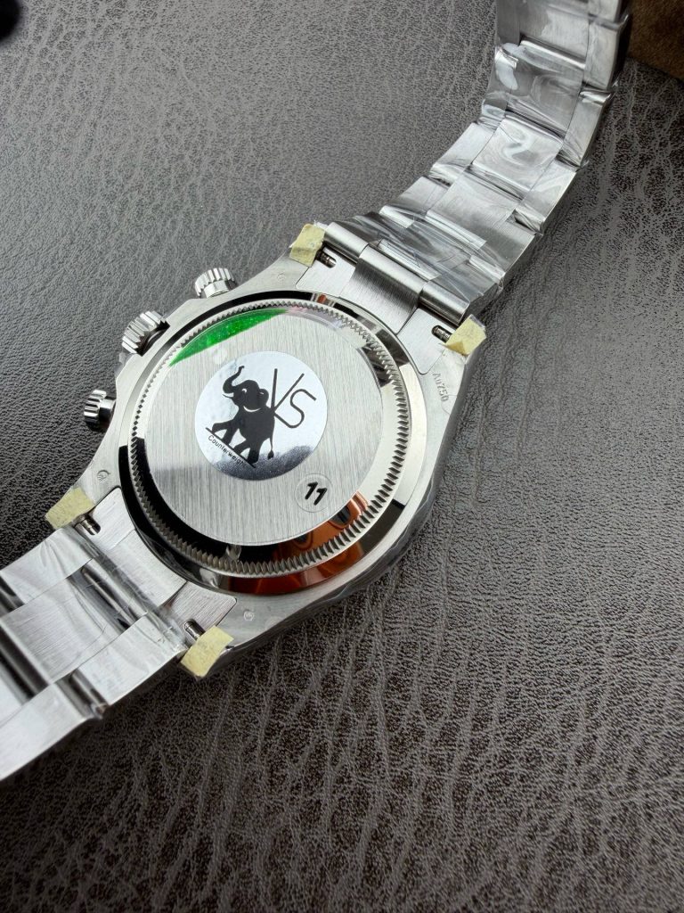 Caseback view of the VSF Daytona showing the brushed center and deep Au750 lug hallmarks